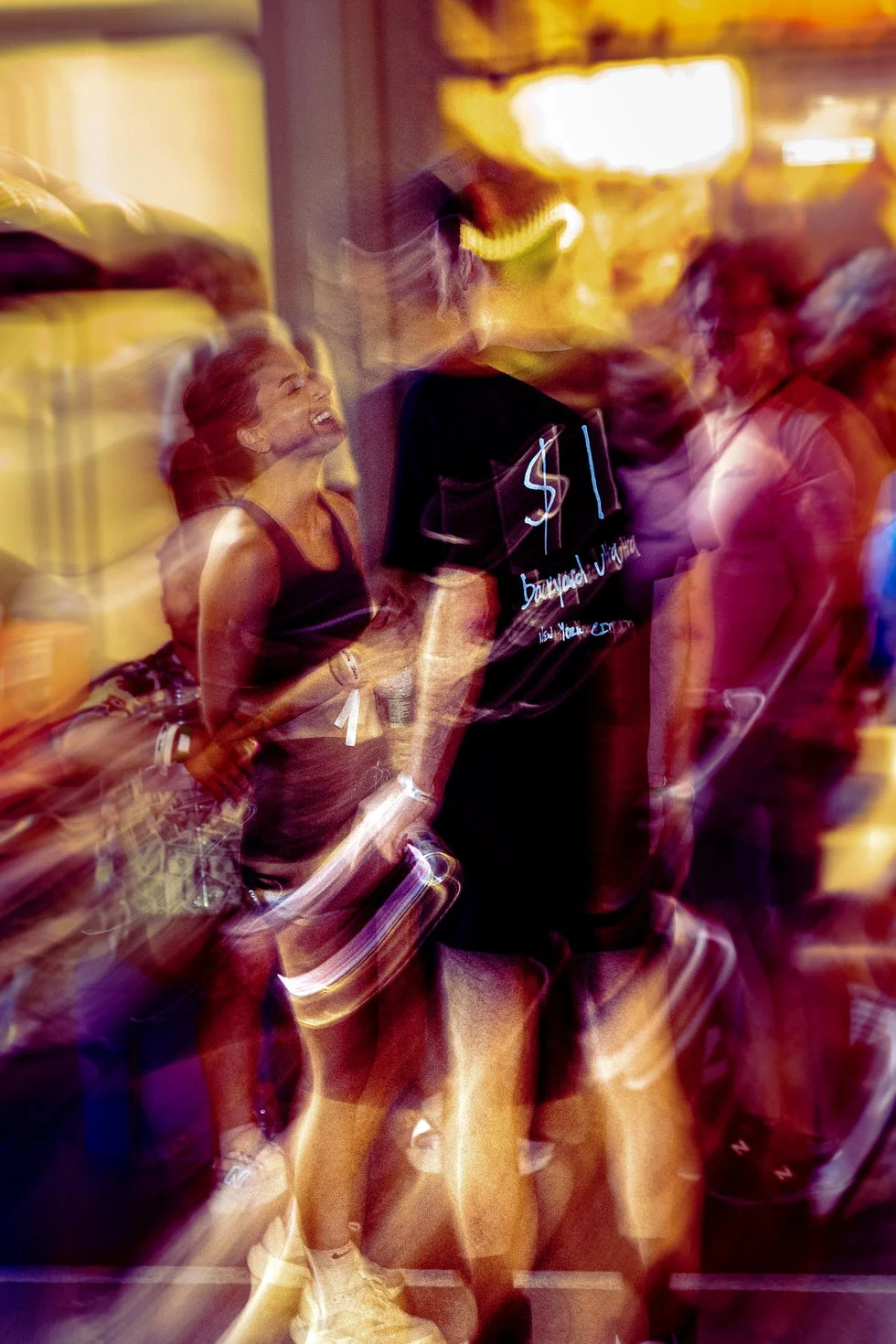 Blurred motion of people laughing and talking at night event. Blurred motion of people laughing and talking at night event.